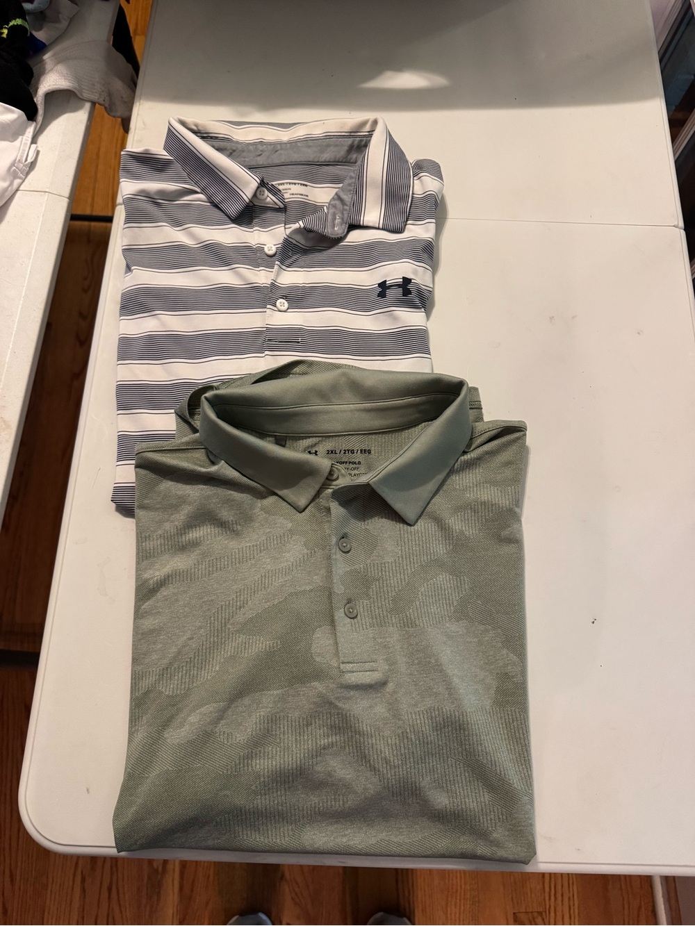 Pair of Under Armour golf polos